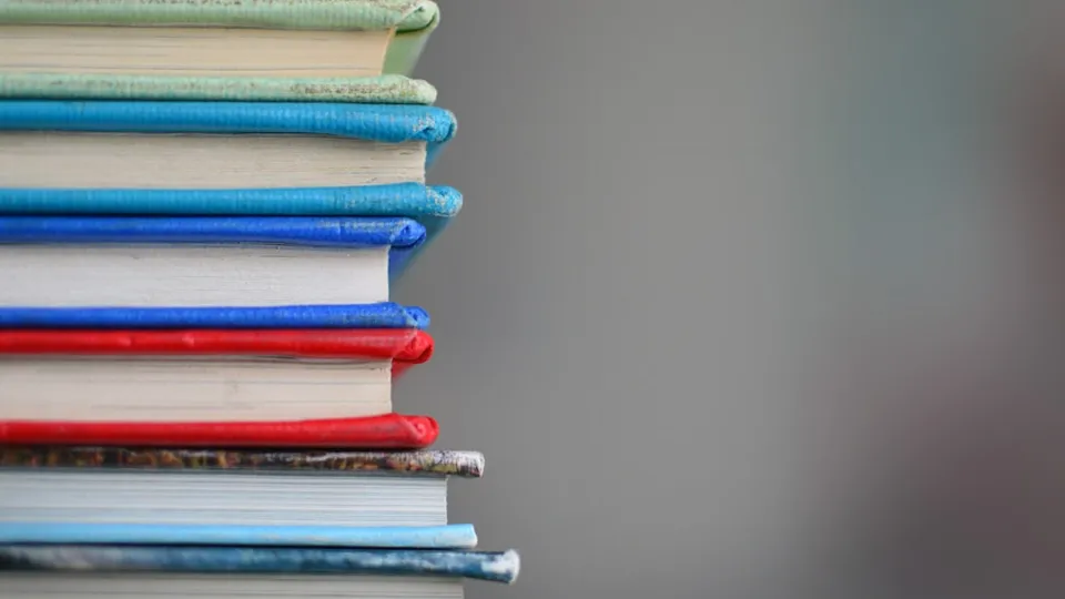 shallow focus photography of books