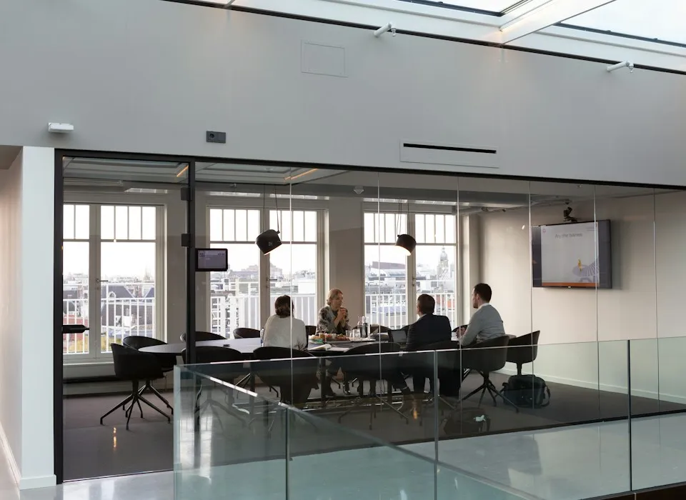 people sitting on chair inside building