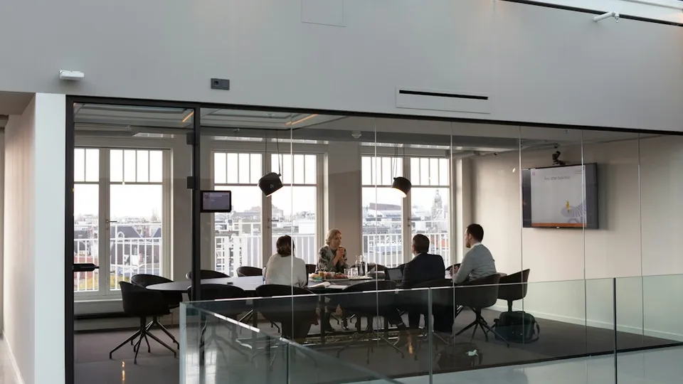people sitting on chair inside building